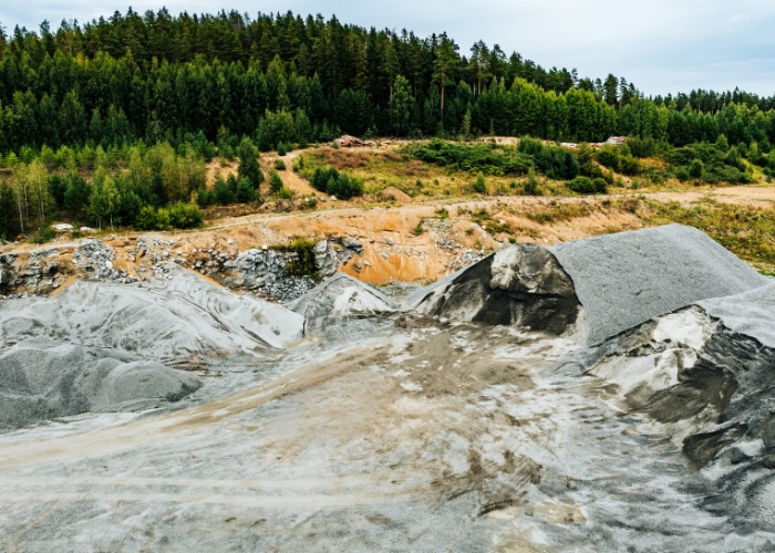 Aerial view of industrial land next to nature